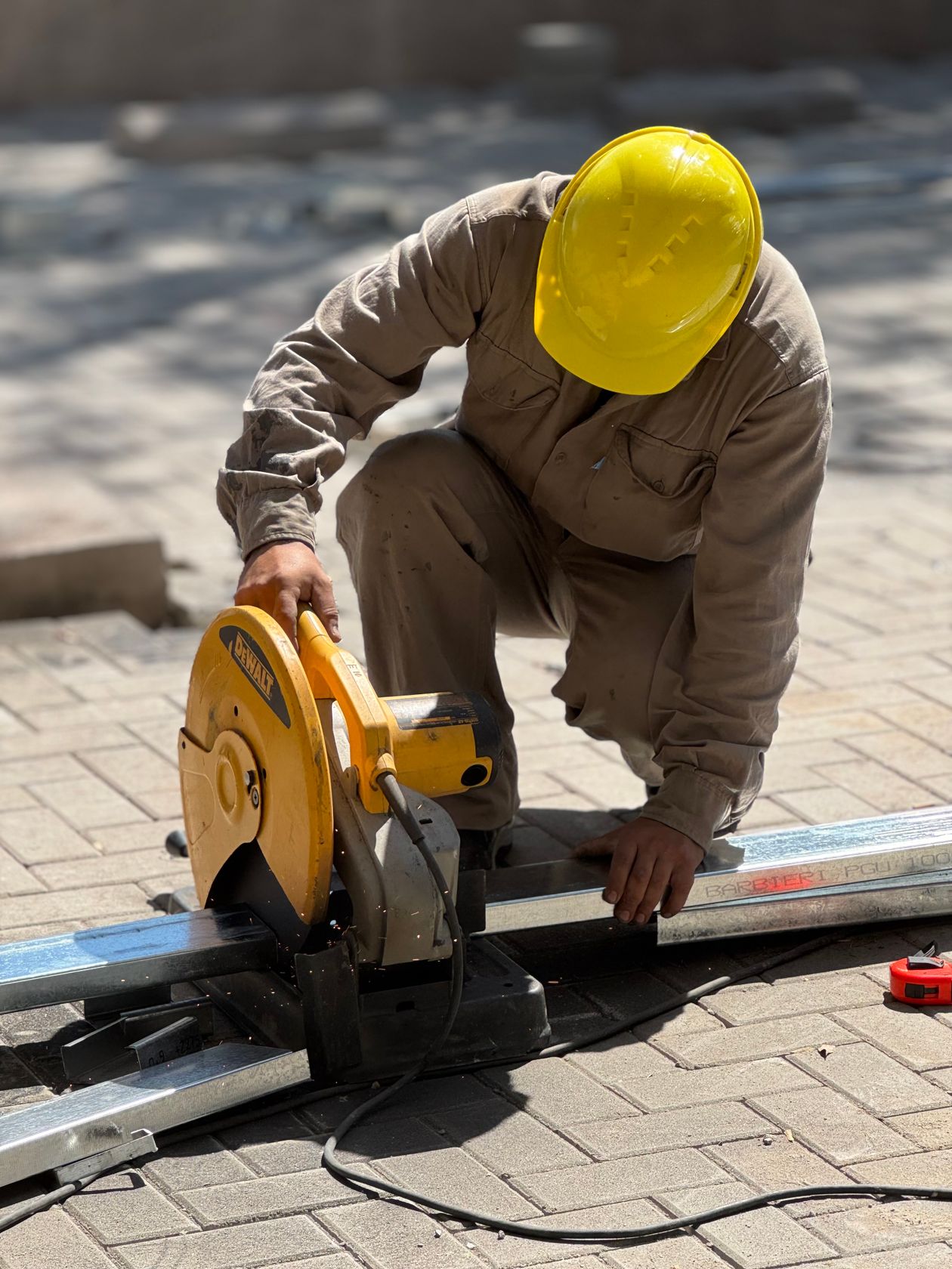 Cutting concrete under the OSHA silica standard for construction generates respirable dust